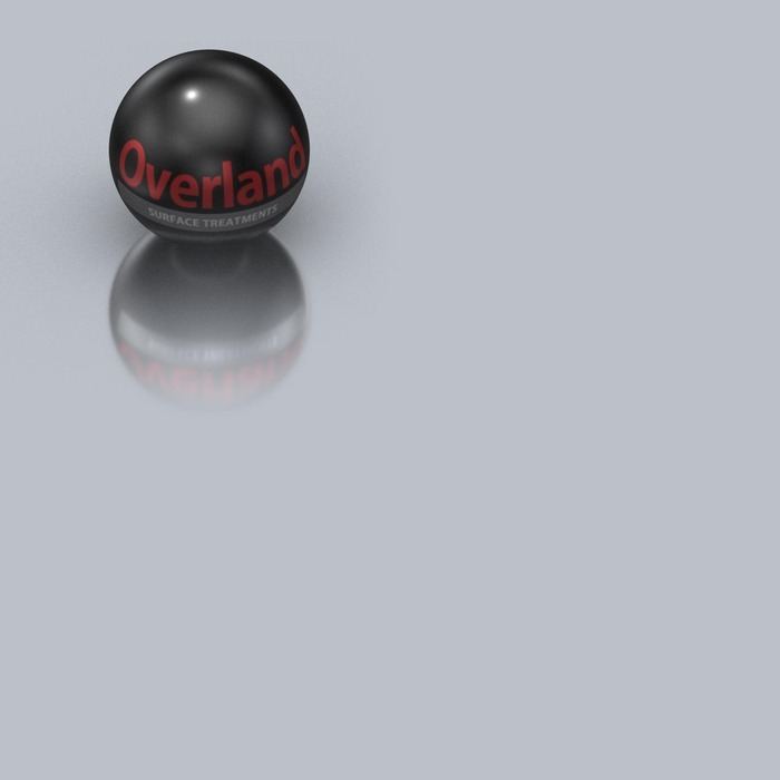 Black sphere reflected in a bright aluminium surface
